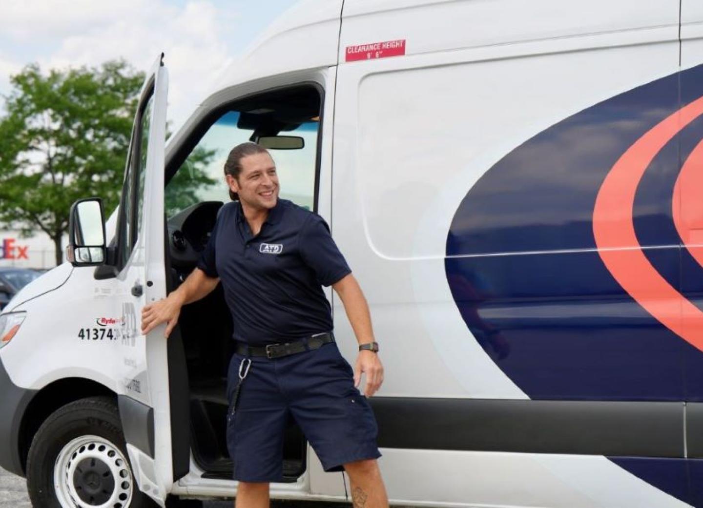 Associate leaving truck that is ATD Branded