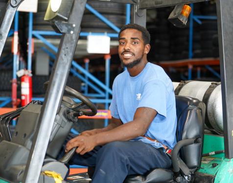 ATD associate on forklift